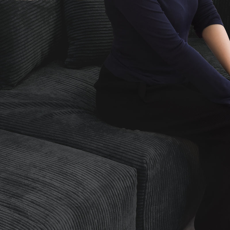 Corduroy 7-Seat Corner Sectional + Ottoman in Obsidian